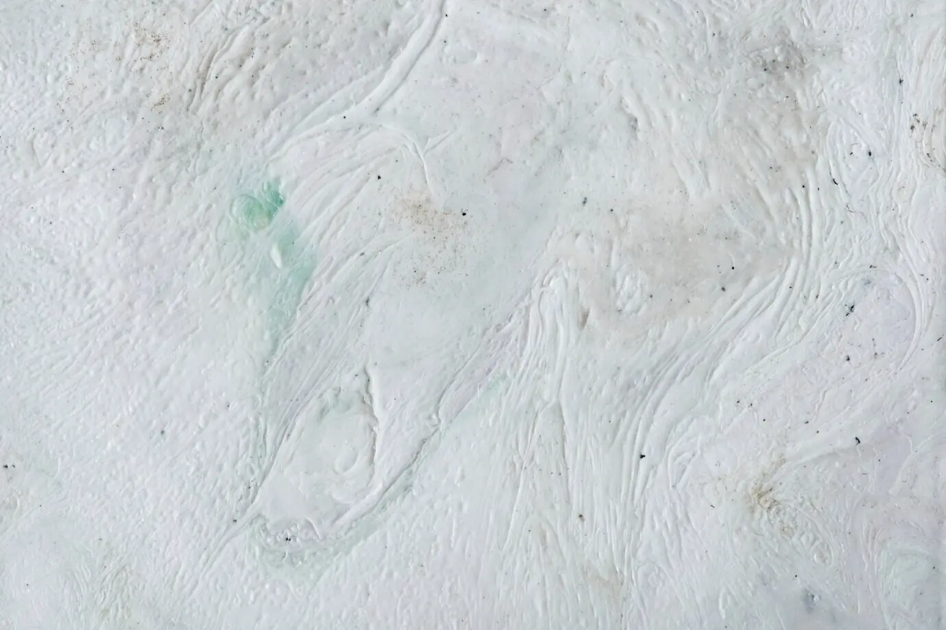 Close-up view of a marble-textured background.
